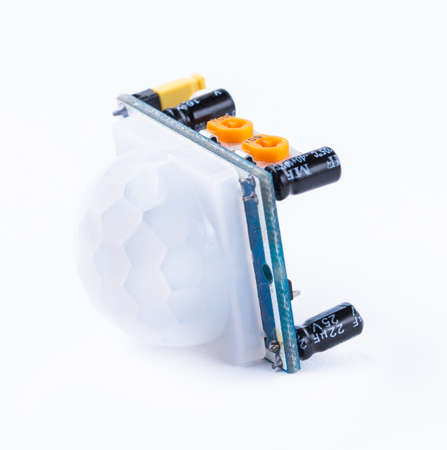 Detail of electronic motion sensor for arduino isolated on white background.