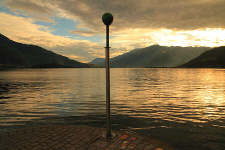 Como lake (Sorico), walking at sunsetの写真素材
