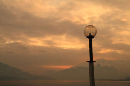 Como lake (Sorico), walking at sunsetの写真素材