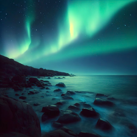 Aurora borealis over rocky beach and ocean. Northern lights in Teriberka, Russia.の素材