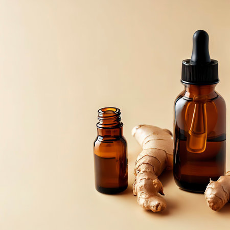 mock up amber glass dropper bottles and ginger root on beige background copy space natural cosmetic conceptの素材