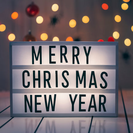 Lightbox with text Merry xmas and happy new year and christmas decorの素材