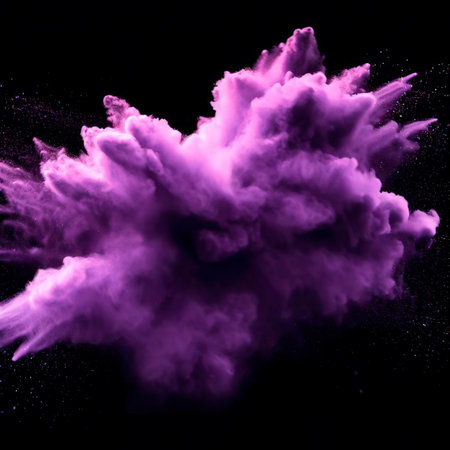 Purple powder explosion cloud on black backgroundの素材