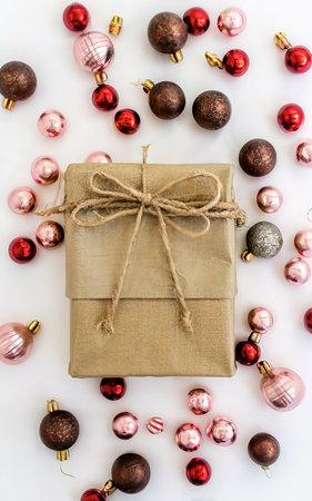 Craft gift bag, decorative balls on a white backgroundの素材