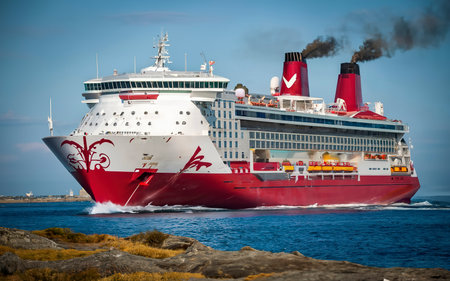 Red cruise liner. Large passenger ferry underwayの素材