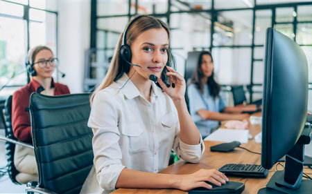 selective focus of customer service agent in headset working at call centerの素材