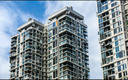 Close up architecture background of highrise condominium building in big city downtownの素材