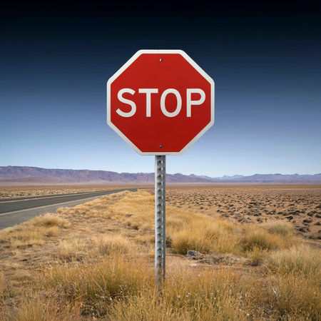 Concept of a stop sign in the middle of nowhere. Signifies the pace of modern life.の素材