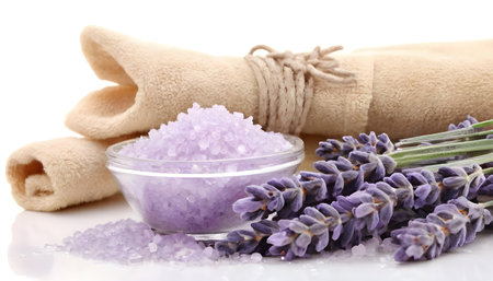 Spa still life with lavender flowers and bath salt, on white backgroundの素材