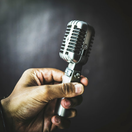 Microphone on hand isolatedの素材