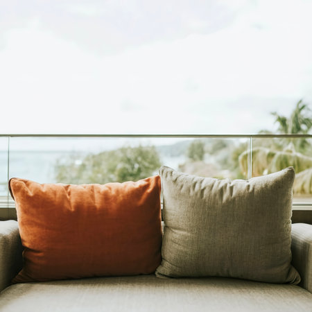 Pillow on sofa bed with outdoor viewの素材