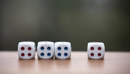 Four dices with a blurry backgroundの素材