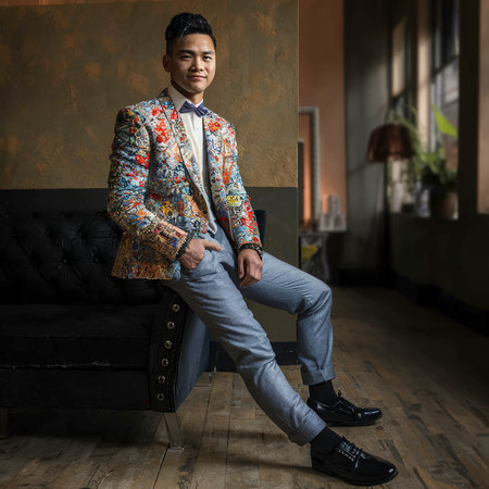 Groom is wearing shoes indoors. Male portrait of handsome guyの素材