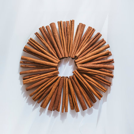 cinnamon sticks isolated on white backgroundの素材
