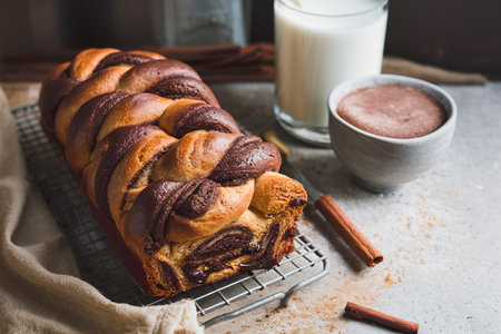 CInnamon chocolate babka on a cooling rack with milkの素材