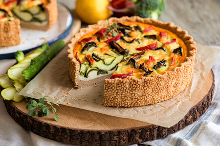Quiche with tofu and vegetables, and millet crustの写真素材
