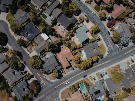 An aerial view of a residential neighborhood with houses and trees