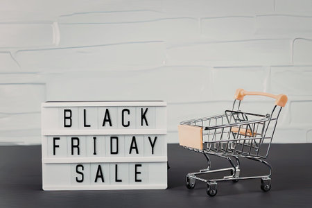 Black friday sale shopping cart with discount offers