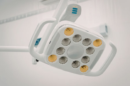 A dental LED light with multiple light sources, used for illuminating the oral cavity during dental...