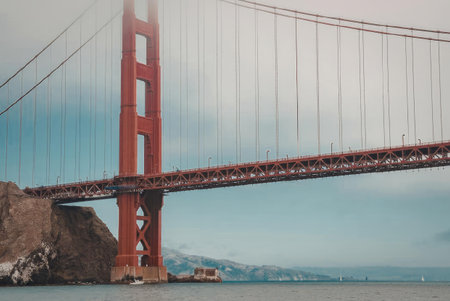 The iconic Golden Gate Bridge in San Francisco, California, stretching across the bay with its...
