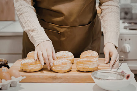 Making delicious donuts in the kitchen with care and precision