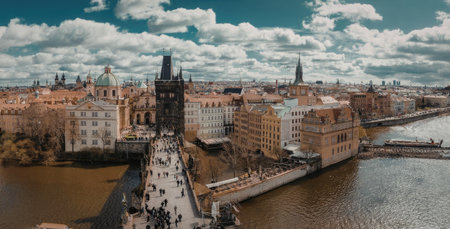 A panoramic view of Charles Bridge in Prague, Czech Republic, showcasing its historic architecture...