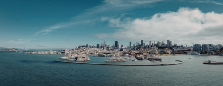 A panoramic view of a city skyline situated by the water, showcasing various boats and a vibrant...