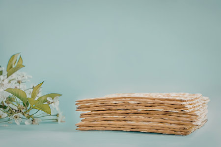 Stack of crackers on a light blue background with flowers