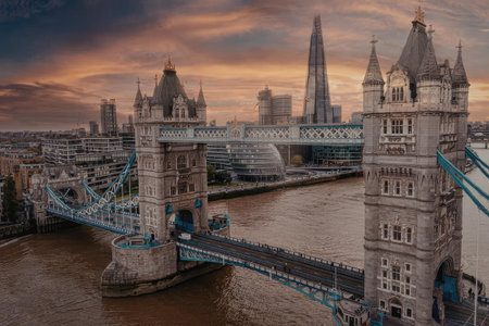An iconic view of Tower Bridge in London during sunset, showcasing its majestic architecture and stunning skyline.の写真素材