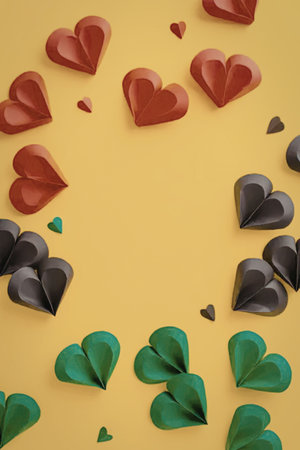 A vibrant image featuring red, green, and black hearts on a bright yellow background.
