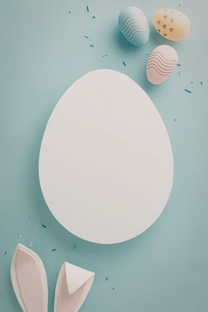 An image of Easter eggs and bunny ears on a blue background with a large white egg