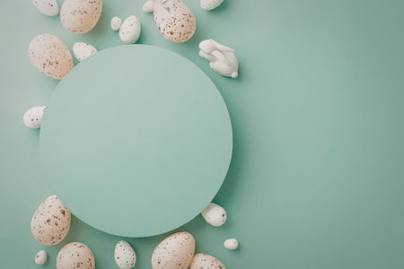 A mint green background with a large circle and decorated Easter eggs