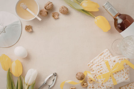 A beautifully arranged table setting for a Jewish holiday, featuring traditional foods and symbols...