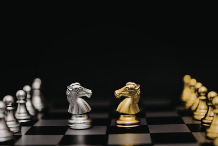 A chessboard with silver and gold pieces, showcasing a knight and pawn in the foreground, against a dark background.