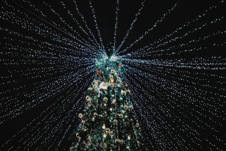 Magical christmas tree shining brightly in the night sky