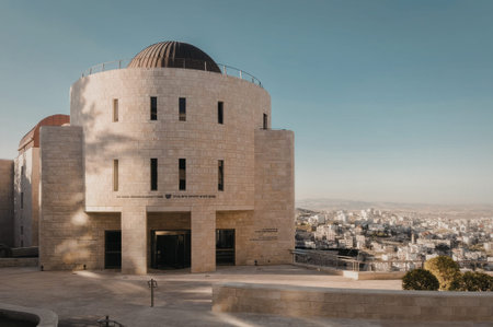 a large building with a dome on top of a hill