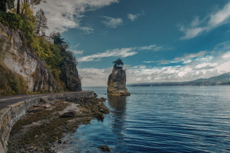 a pixelated image of a rocky coastline with a body of water and a blue sky with clouds. the water is calm and blue, and there are some rocks and cliffs in the foreground. the sky is blue with some white clouds.