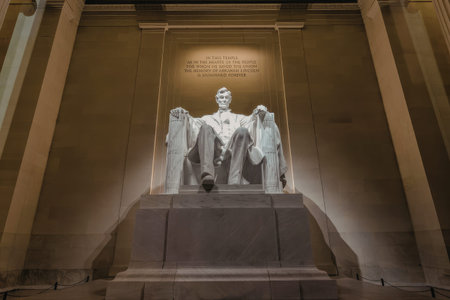 a statue of a seated figure in a monument