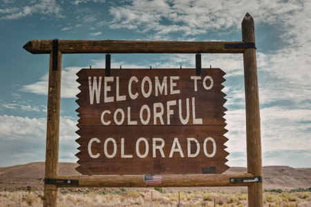 a pixelated image of a wooden sign that reads welcome to colorful colorado