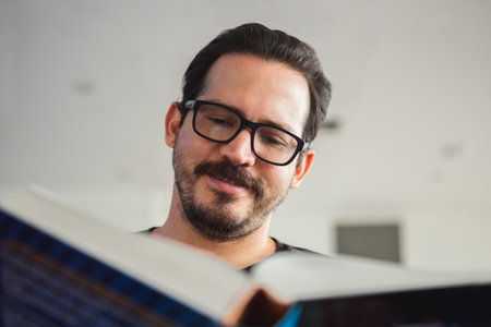 Close up of man readingの写真素材