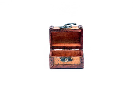single open wooden chest on white background.の写真素材