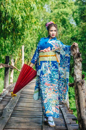 a portrait of japanese kimono woman