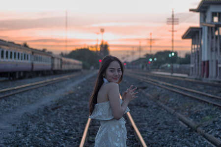 silhouette of girl  at sunsetの写真素材