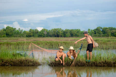 three boy play in natureの写真素材