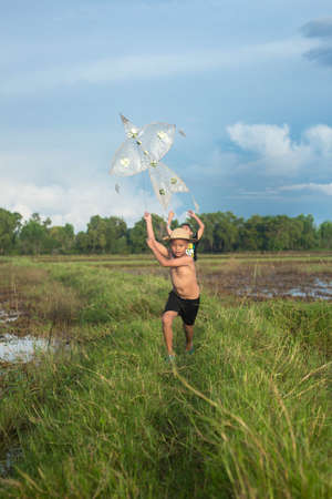 three boy play in natureの写真素材