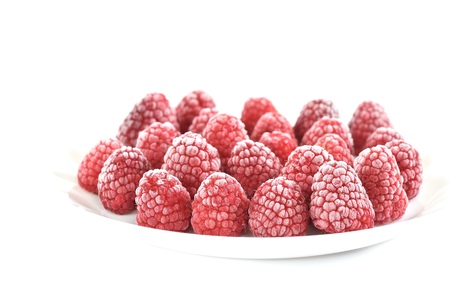 Frozen raspberry on the dishの写真素材