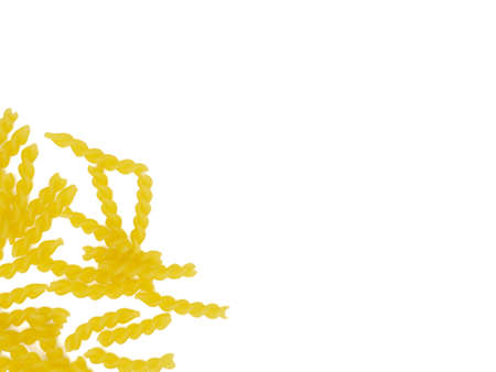 Fusilli pasta on a white backgroundの写真素材