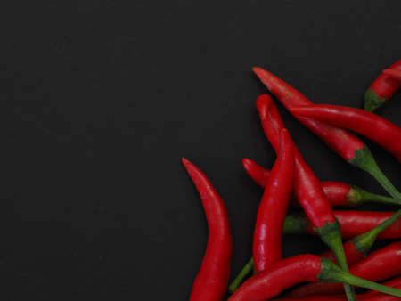 chili peppers on a black backgroundの写真素材