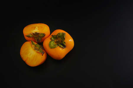 fresh ripe Persimmon or Chinese date plum persimmon photoの写真素材