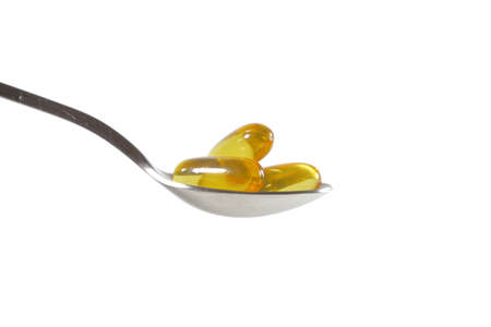 Omega 3 image on a spoon on a white backgroundの写真素材
